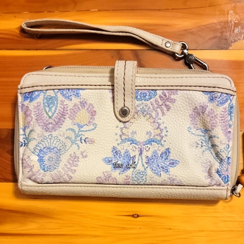 The Sak Iris Beige and Lavender Patterned Wristlet